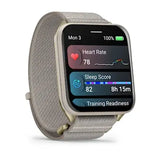 Garmin Venu X1 - Soft Gold with titanium caseback and French Gray nylon band